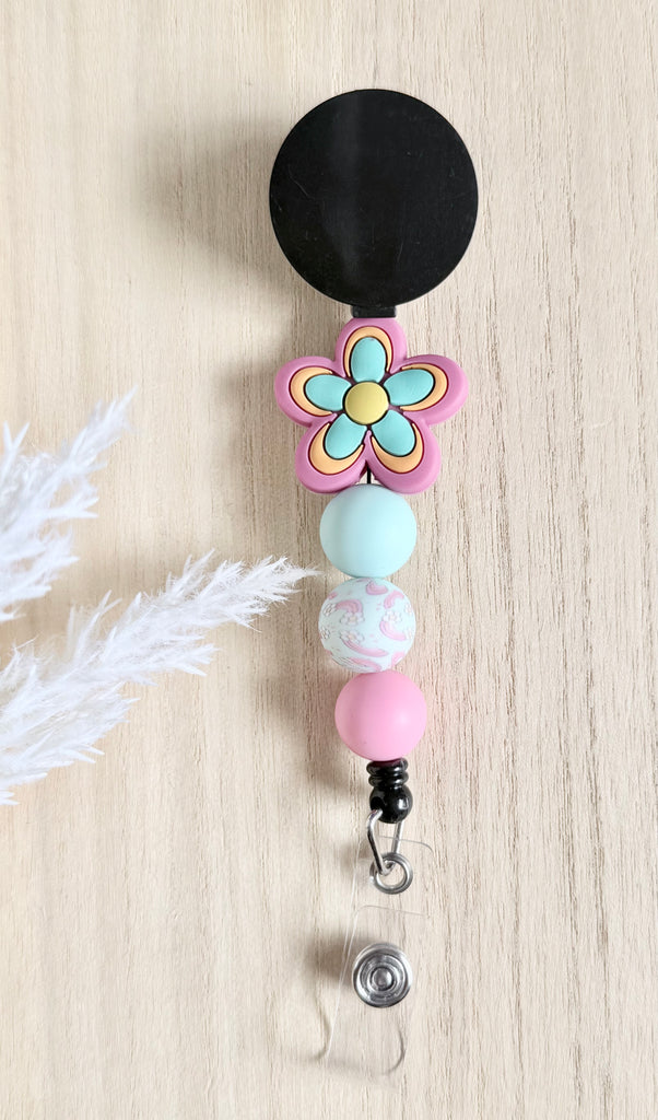 Vibrant Flower Badge Reel